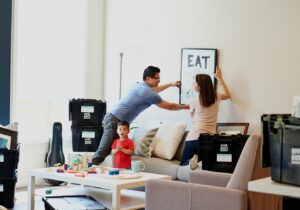 A couple unpacks boxes in their new home