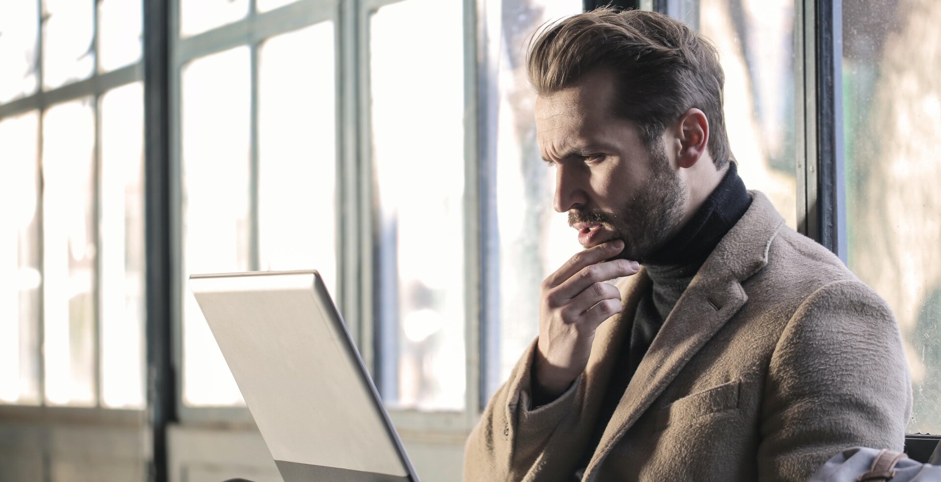 Business professional working on laptop