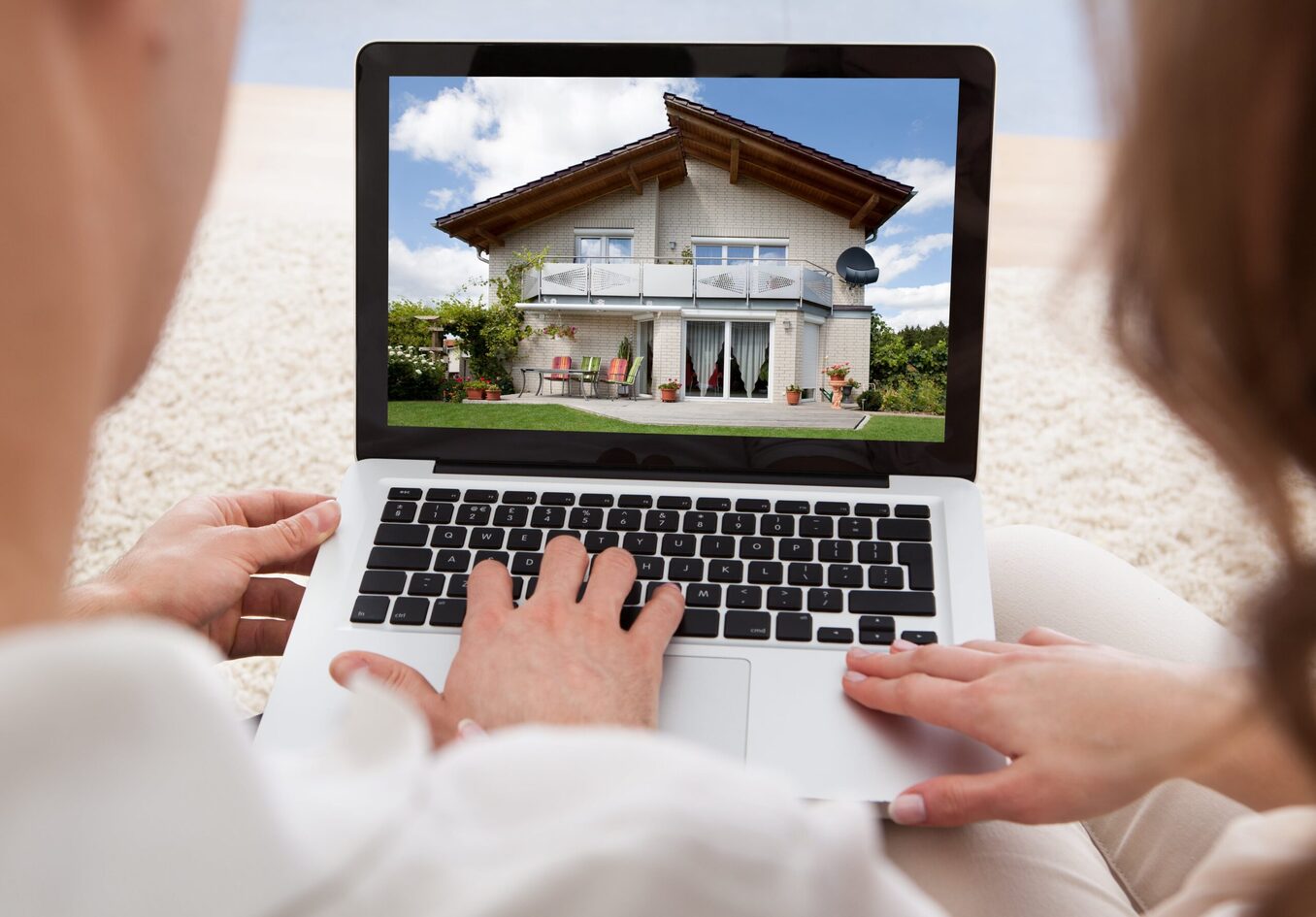 Home buying couple researching homes
