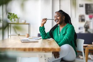 Young adult female professional working in a modern office