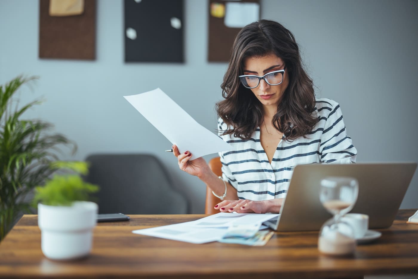 Female professional reviewing documents