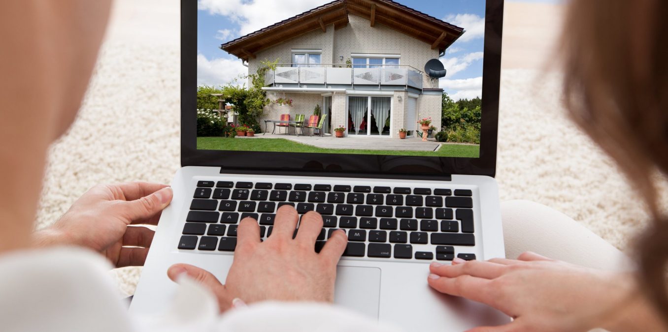 couple researching homes to buy