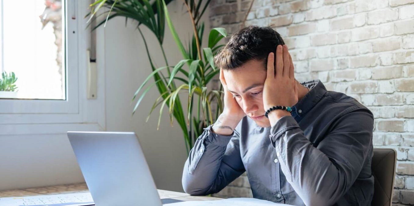 Confused,Frustrated,Young,Man,Reading,Letter,,Debt,Notification,,Bad,Financial