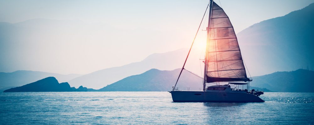 Sailboat,In,The,Sea,In,The,Evening,Sunlight,Over,Beautiful