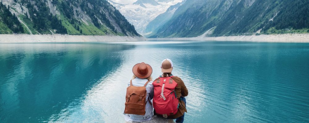 Travelers,Couple,Look,At,The,Mountain,Lake.,Travel,And,Active