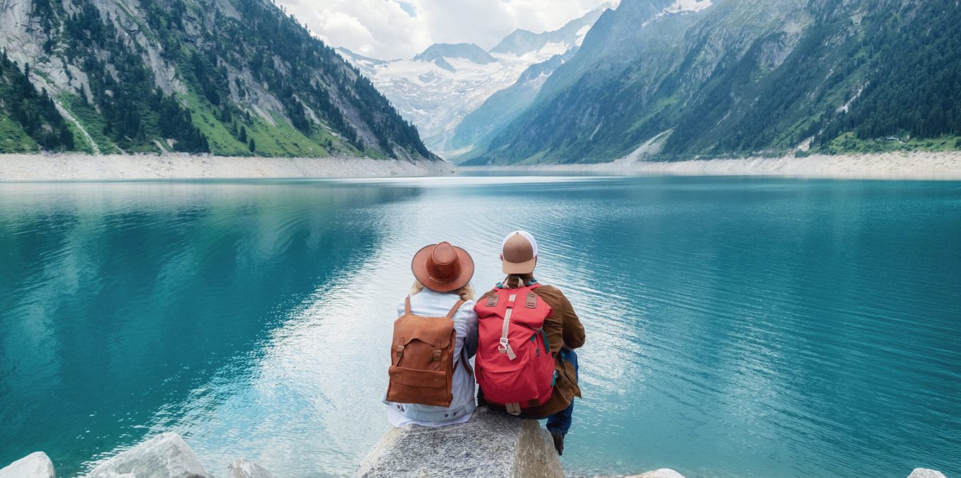 Travelers,Couple,Look,At,The,Mountain,Lake.,Travel,And,Active