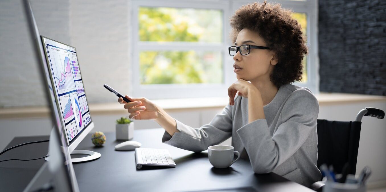 African American Business Data Analyst Woman Using Computer