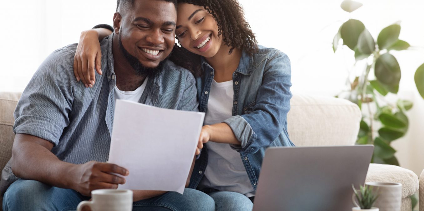 Family,Insurance,Concept.,Positive,Black,Couple,Reading,Documentation,At,Home,