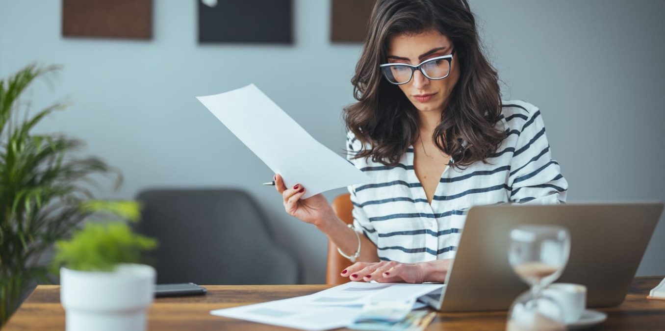 Female professional reviewing documents