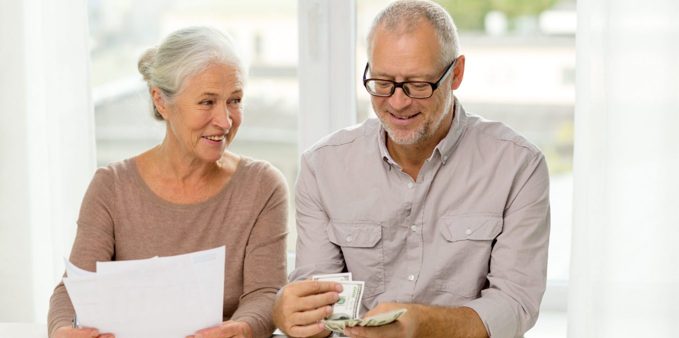 Family,,Savings,,Age,And,People,Concept,-,Smiling,Senior,Couple