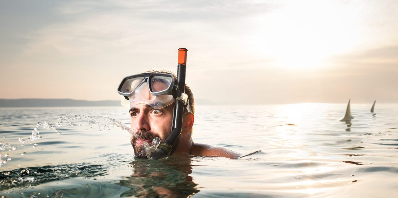 Young,Caucasian,Man,Chased,By,Shark,predator,Attack,Escape,In,Sea