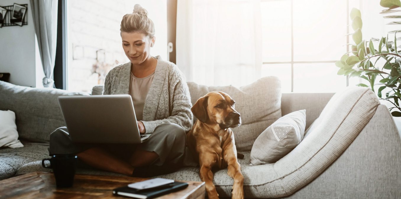 Businesswoman,Working,On,Laptop,Computer,Sitting,At,Home,With,A