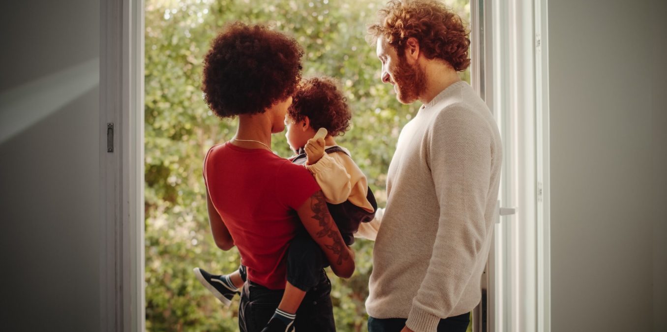 Loving,Mixed,Race,Family,Playing,With,Adorable,Baby,Boy,At