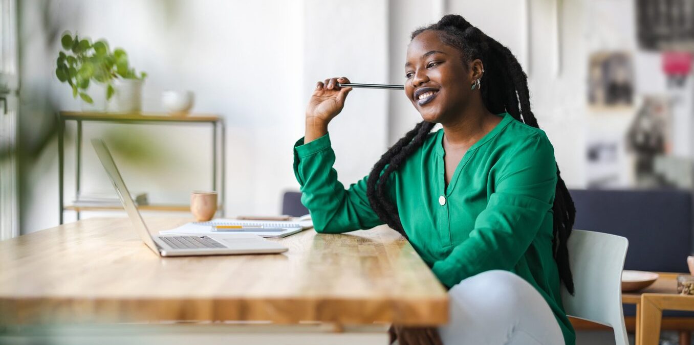 Young adult female professional working in a modern office