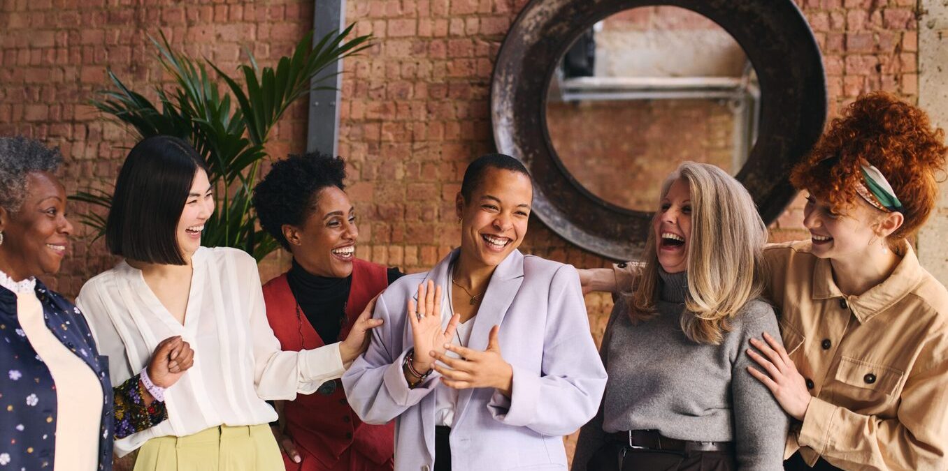 International women's day portrait of cheerful multiethnic mixed age range